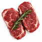 Raw meat with sprigs of rosemary